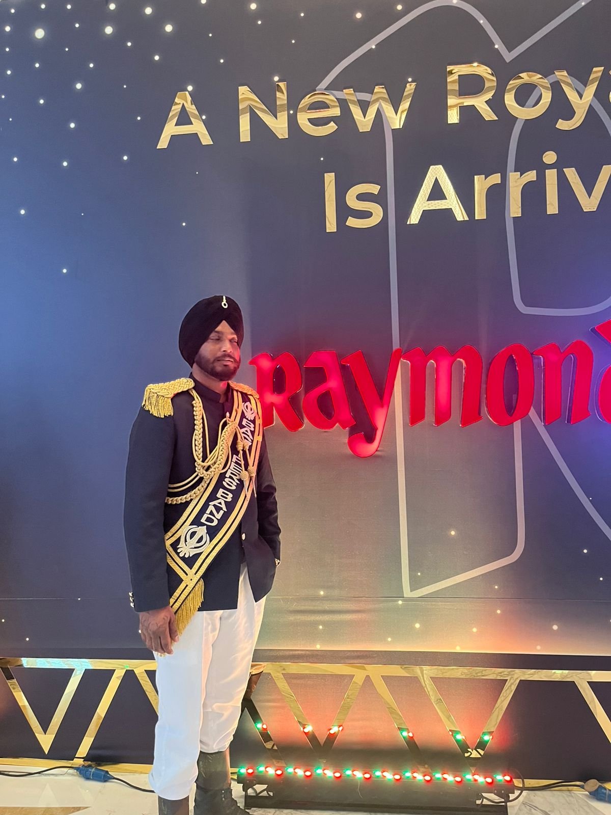 Band leader at event backdrop