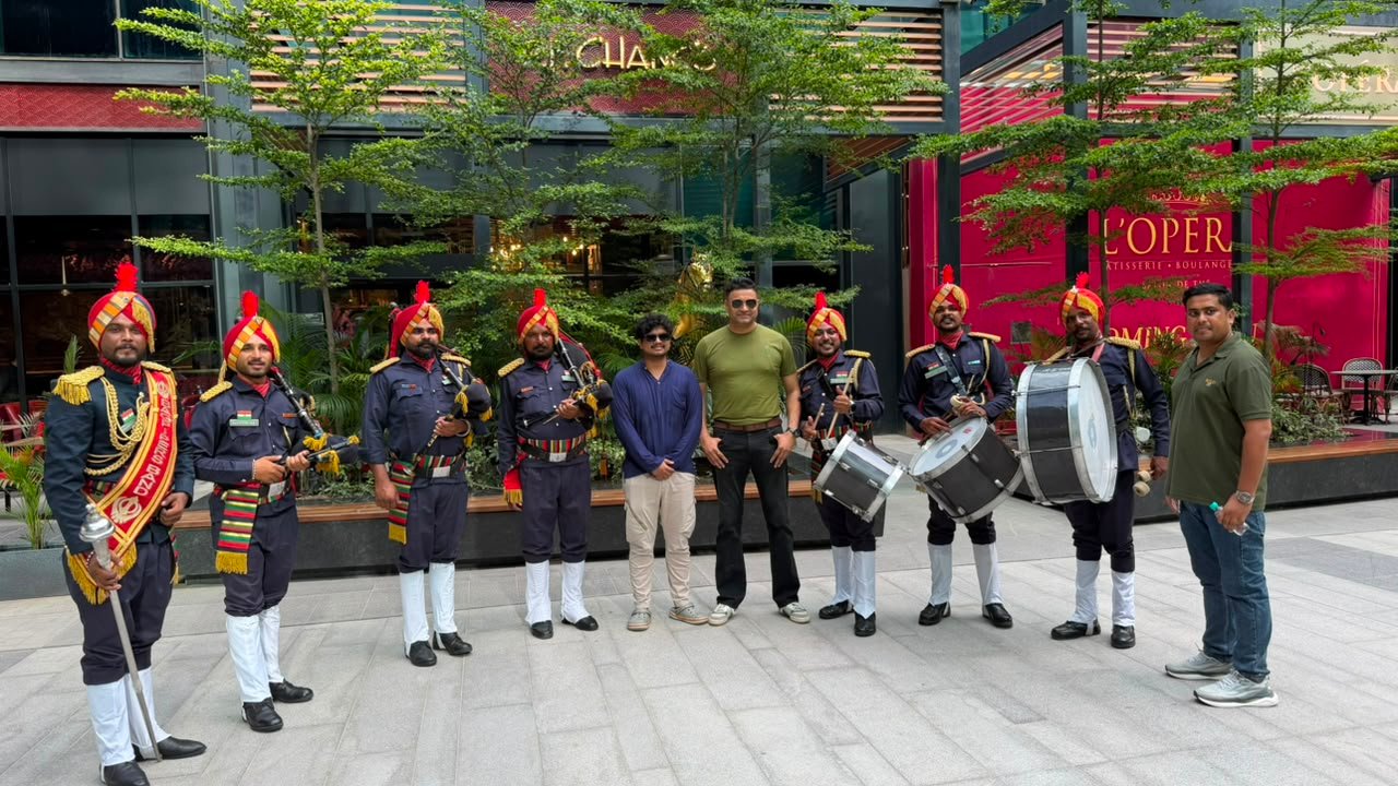 Band members with an event team