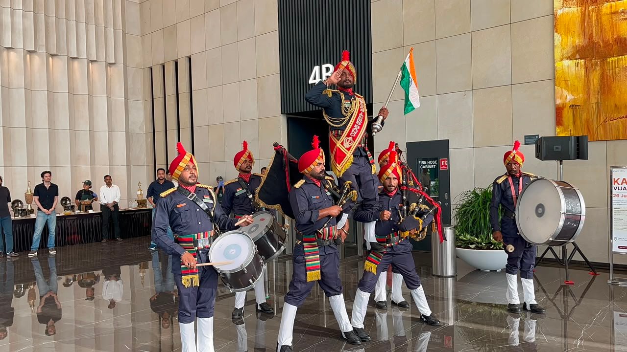 Ceremonial drumline performing indoors