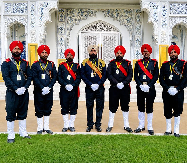 Royal Bagpipe Band Shere Punjab in navy ceremonial uniform