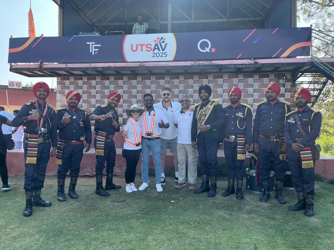 Ceremonial band members at a lively private event setting